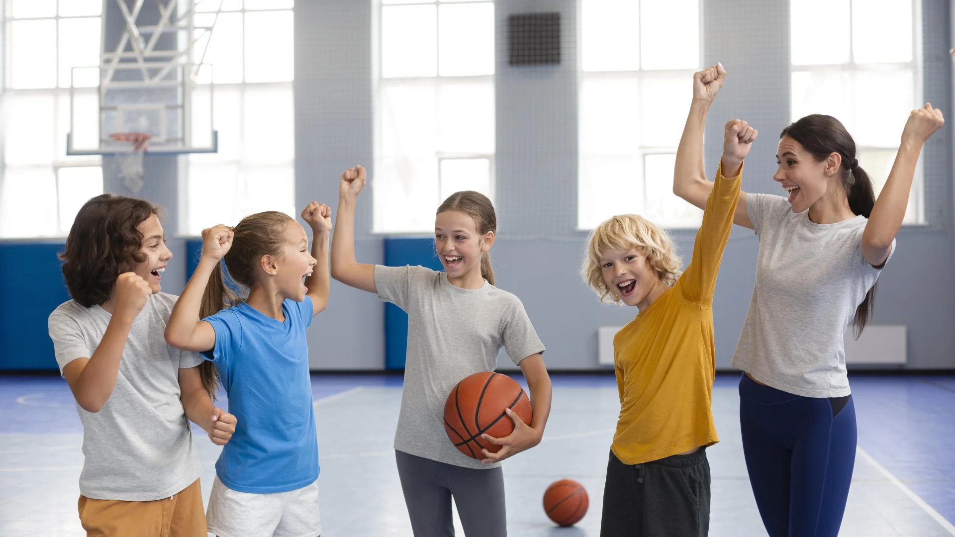 Sport Teacher With His Students